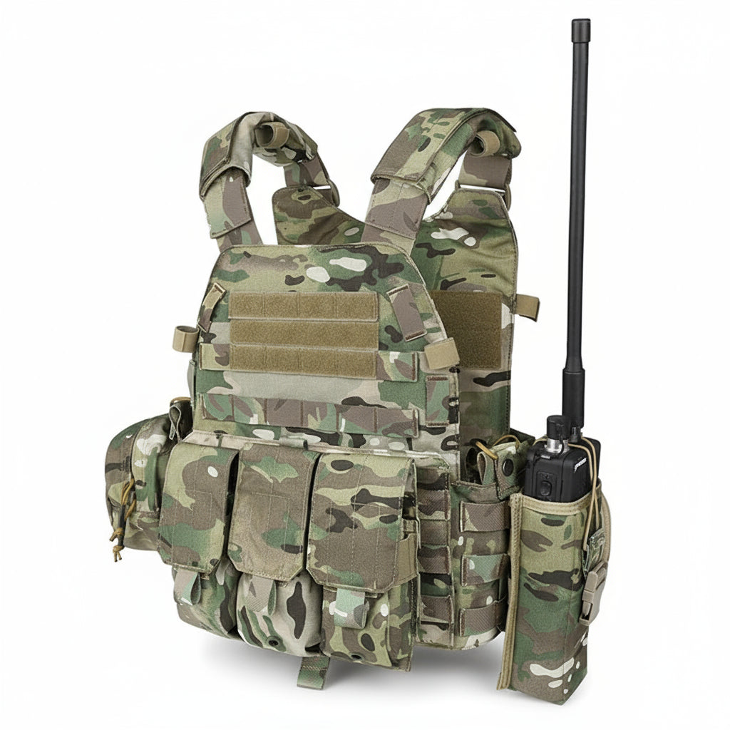 A camouflage Modular Vest Plate Carrier with multiple pouches and radio pouch, equipped with a cummerbund and quick-release tabs. The vest is designed for military-style gear carrying with MOLLE webbing.