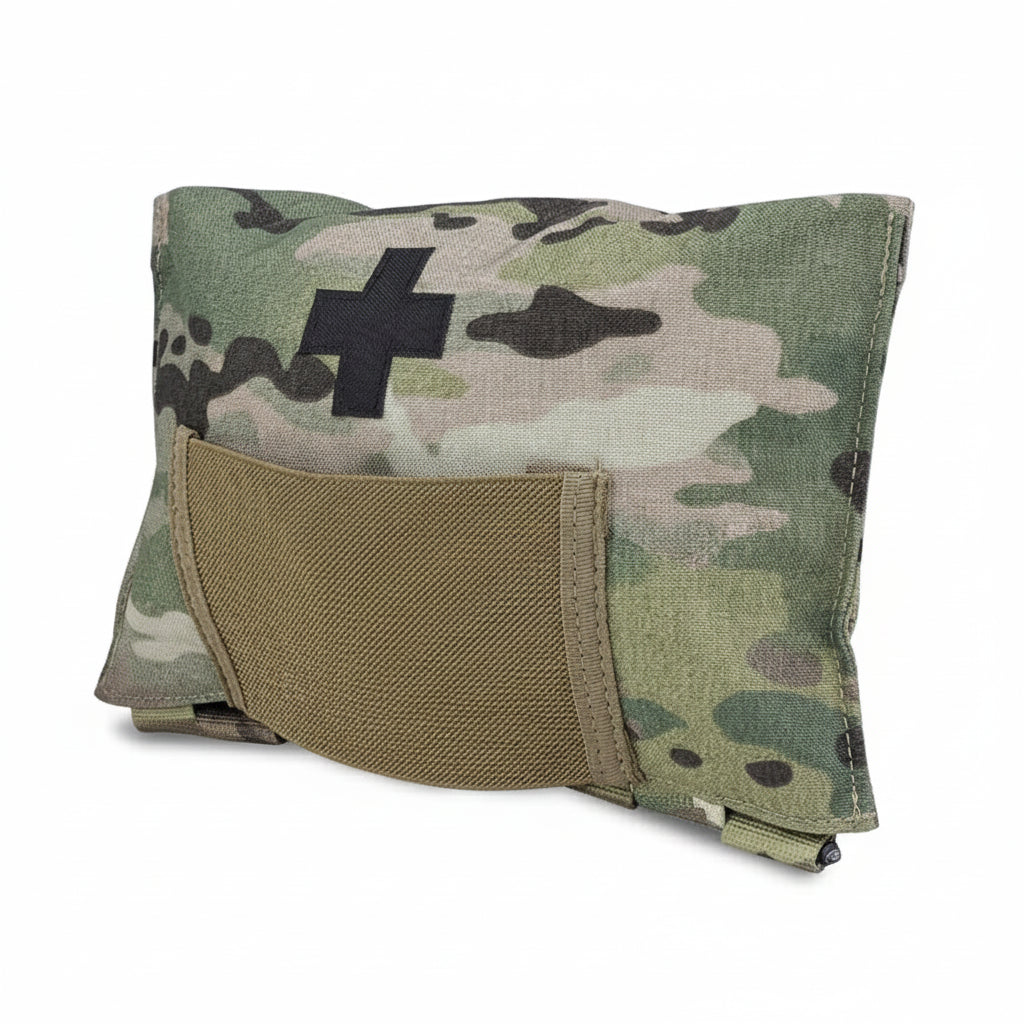 Camouflage first aid kit with a cross symbol on a white background, featuring the Krydex logo.