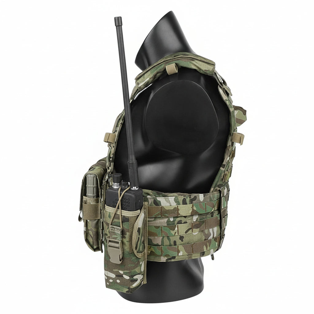 Camouflage tactical vest with radio and pouches on a mannequin against a white background