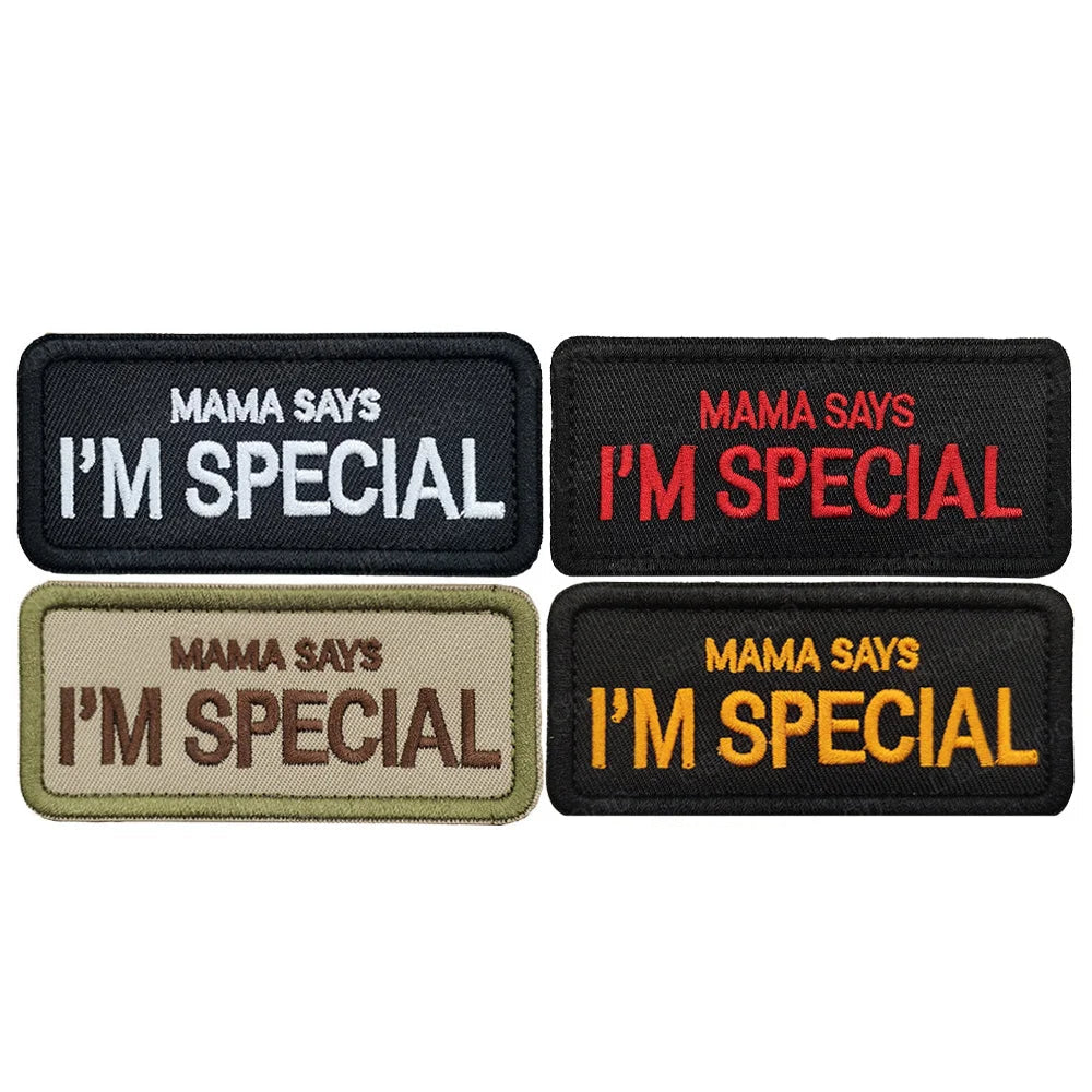 Set of patches with 'Mama says I'm special' text in various colors on a white background.
