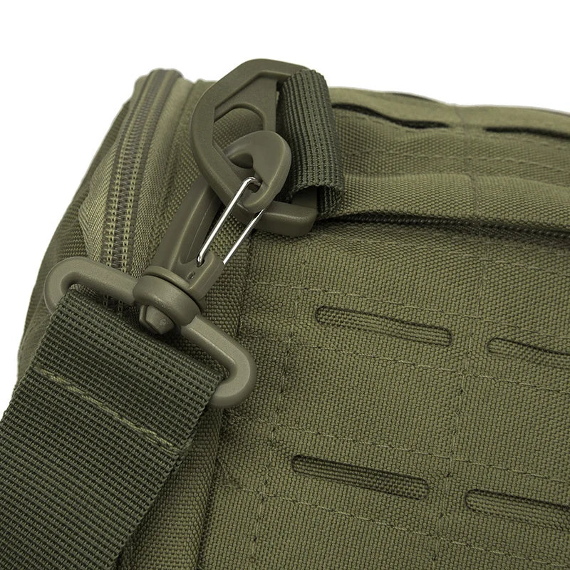 Close-up of a green tactical bag with a carabiner and strap on a white background