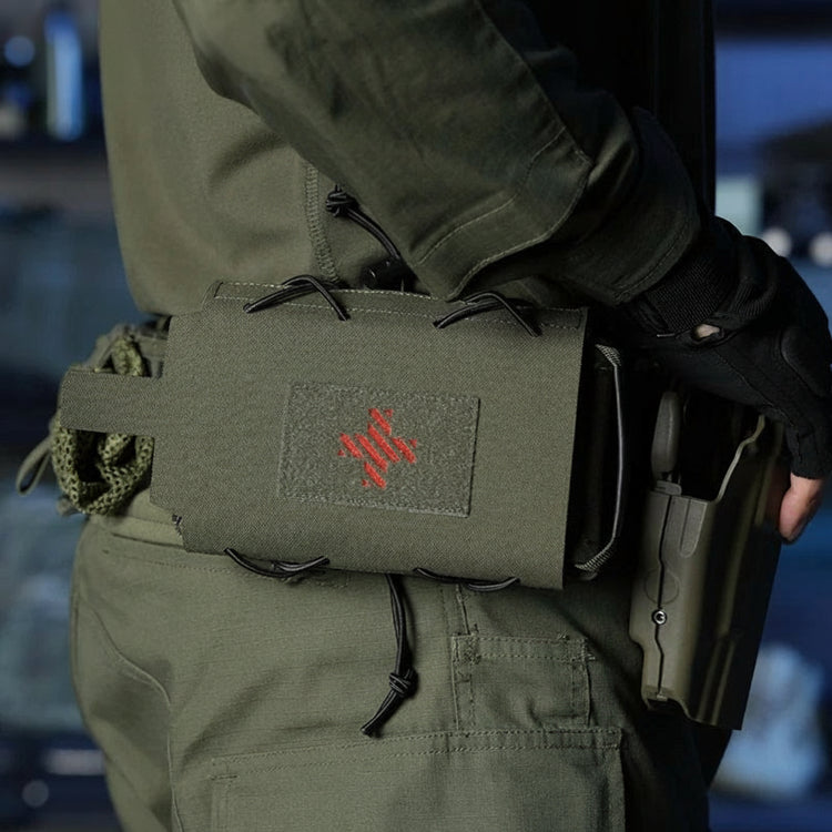 Person wearing tactical gear.