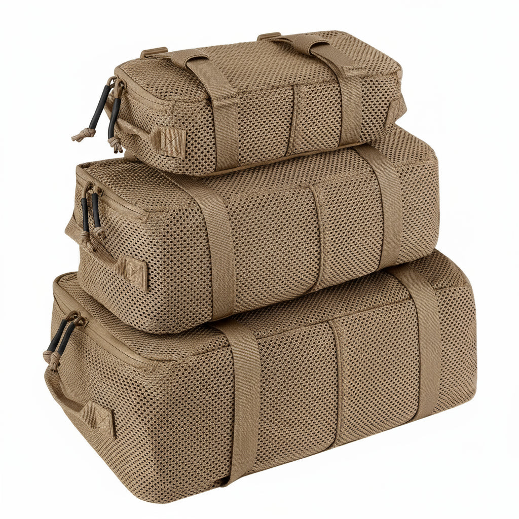 Three stacked tan travel bags with a visible brand logo on a white background