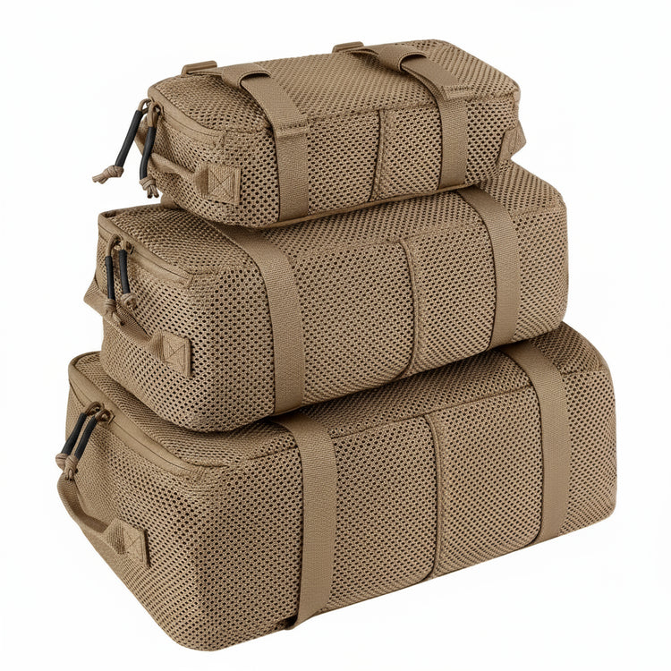 Three stacked tan travel bags with a visible brand logo on a white background