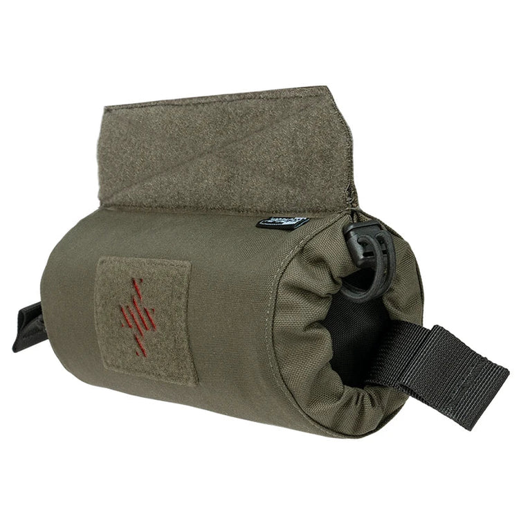 Green tactical pouch with a strap and patch on a white background.
