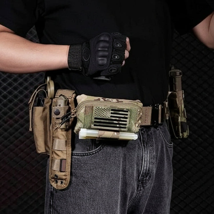 Person wearing tactical gear with a camo pouch on his belt