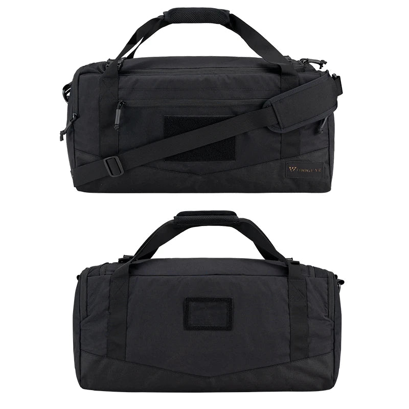 Black duffel bag with shoulder strap on a white background