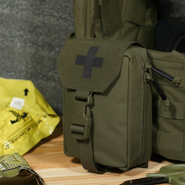 Green tactical bag with a med cross patch on a wooden surface