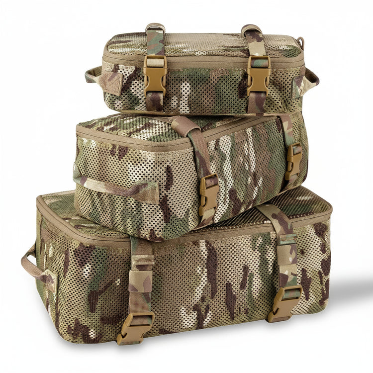 Three camouflage bags stacked on a white background