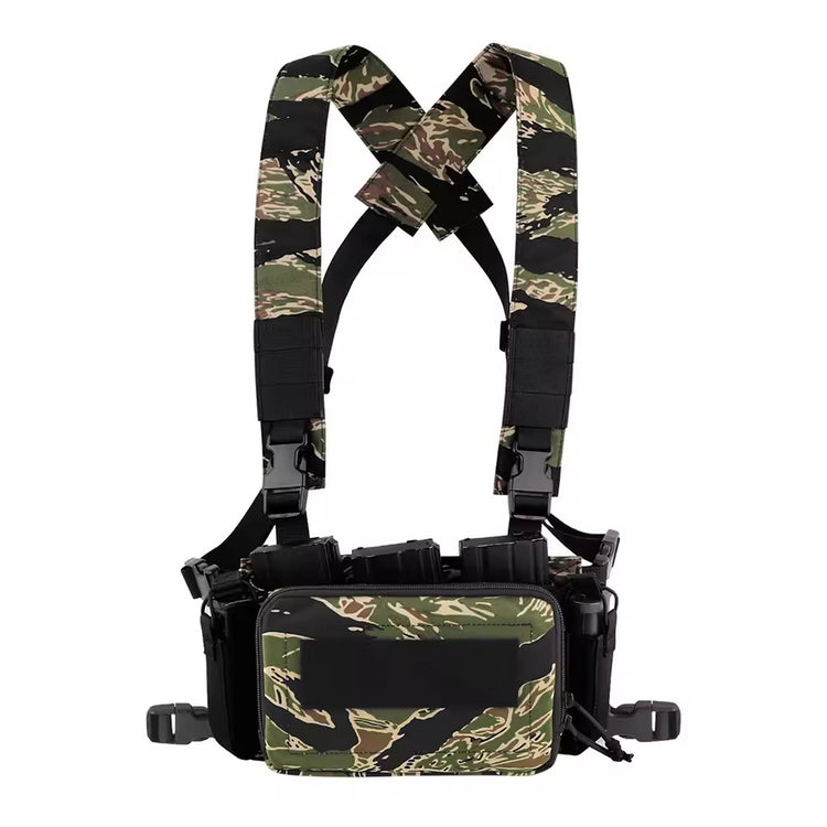 Camouflage tactical vest with multiple pockets and straps on a white background