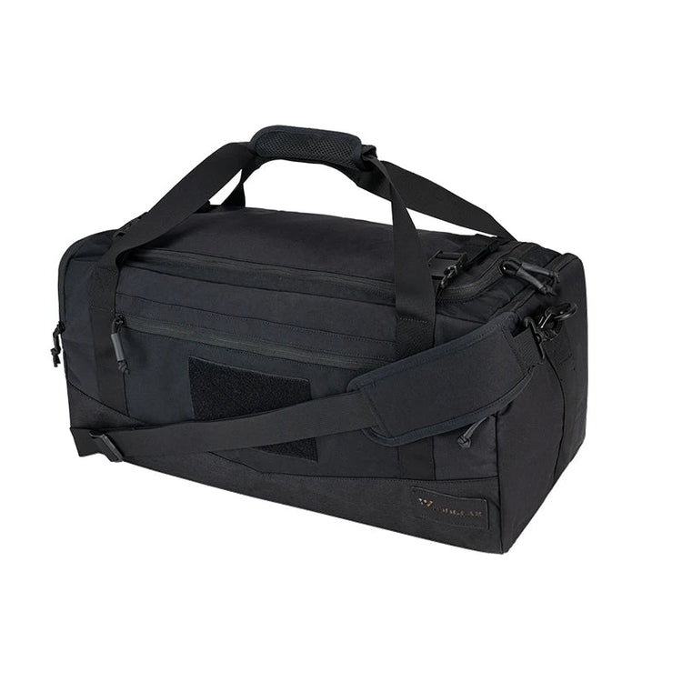 Black duffel bag with multiple straps on a white background
