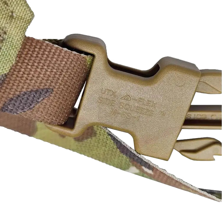 Close-up of a DuraFlex UTX buckle on a multicam camouflage background