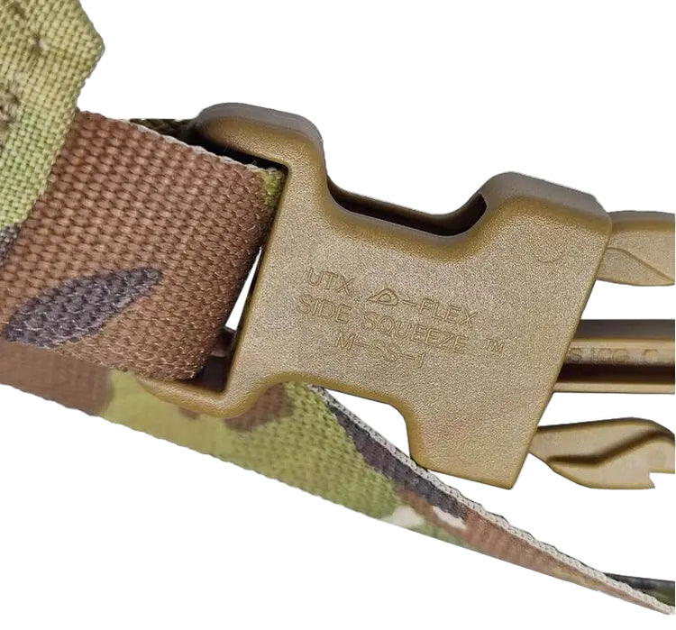 Close-up of a DuraFlex UTX buckle on a multicam camouflage background