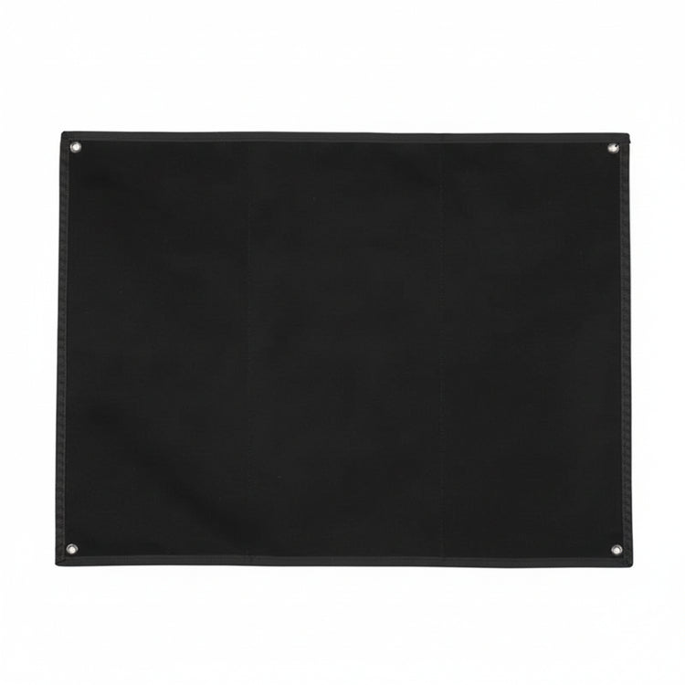 Black hook and loop mat on a white background