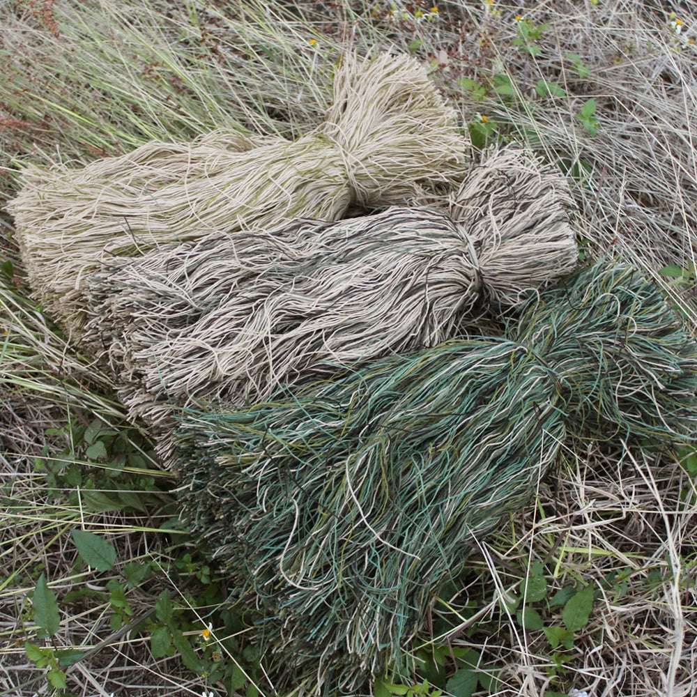 Bundles of Ghillie Burlap Yarn Hessian Twine Jute on a natural background