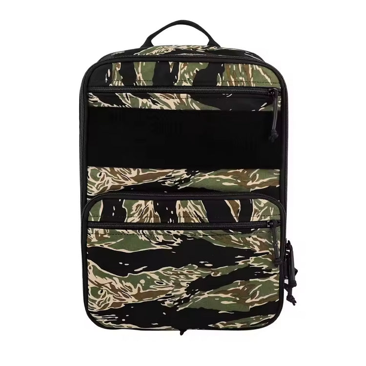 Camouflage-patterned backpack on a white background