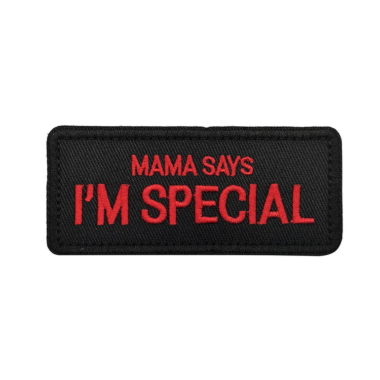 Black patch with red text 'MAMA SAYS I'M SPECIAL' on a white background