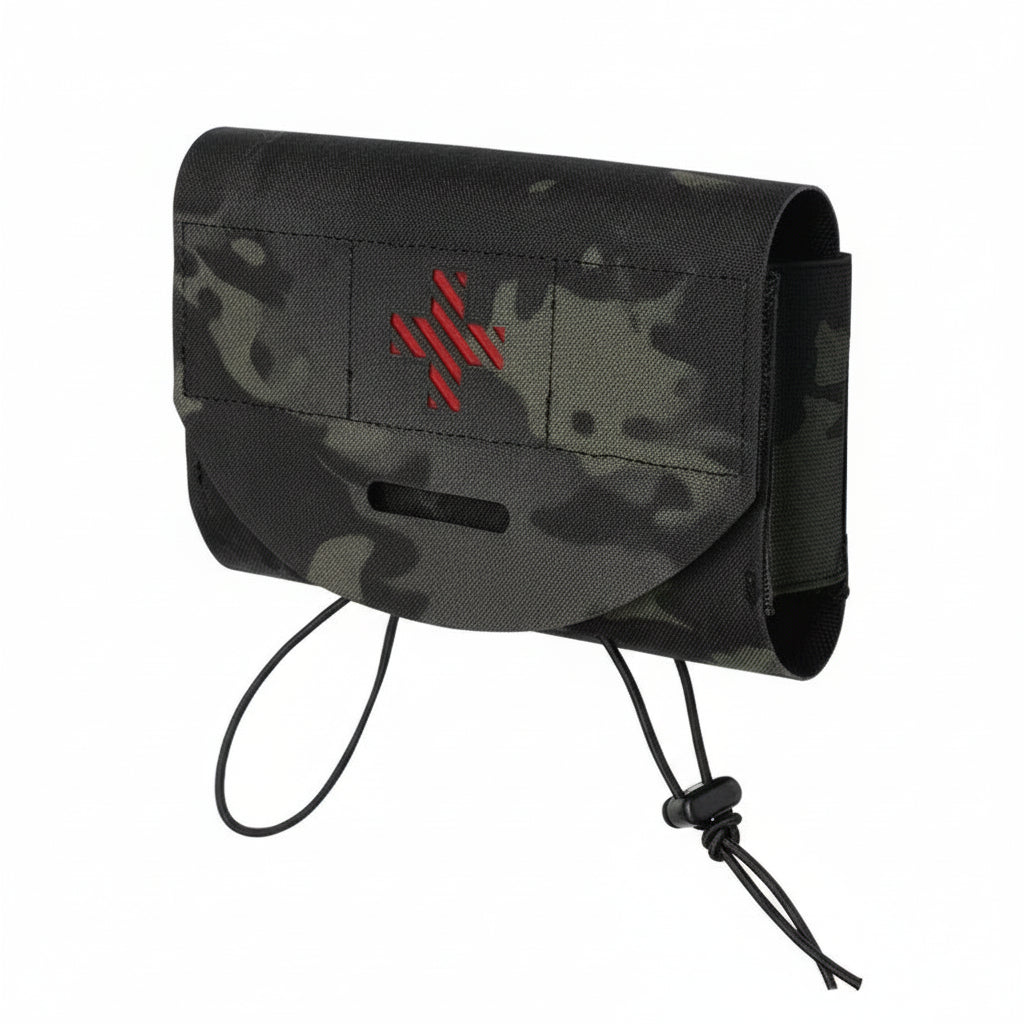 Camouflage pouch with a red cross on a white background