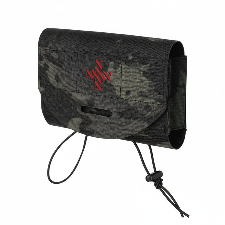 Camouflage pouch with a red cross on a white background