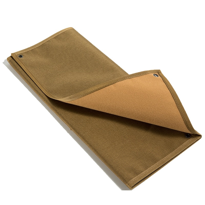 Folded brown hook and loop patch display board on a white background