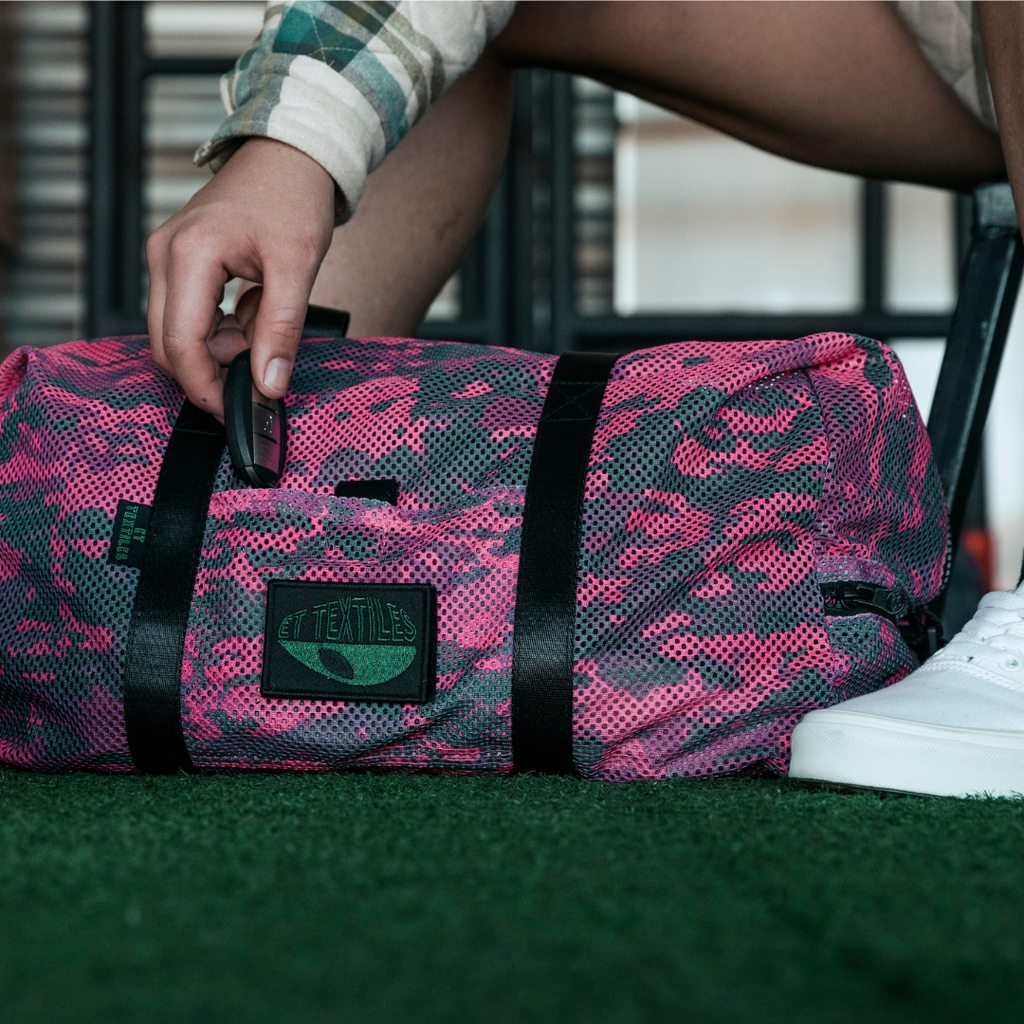 Pink camo duffle bag best sale