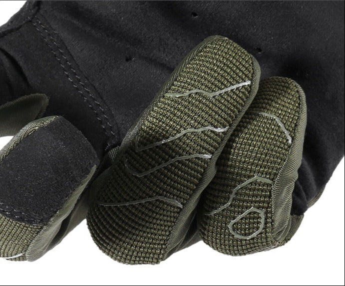 Close-up of green tactical gloves with black accents on a white background